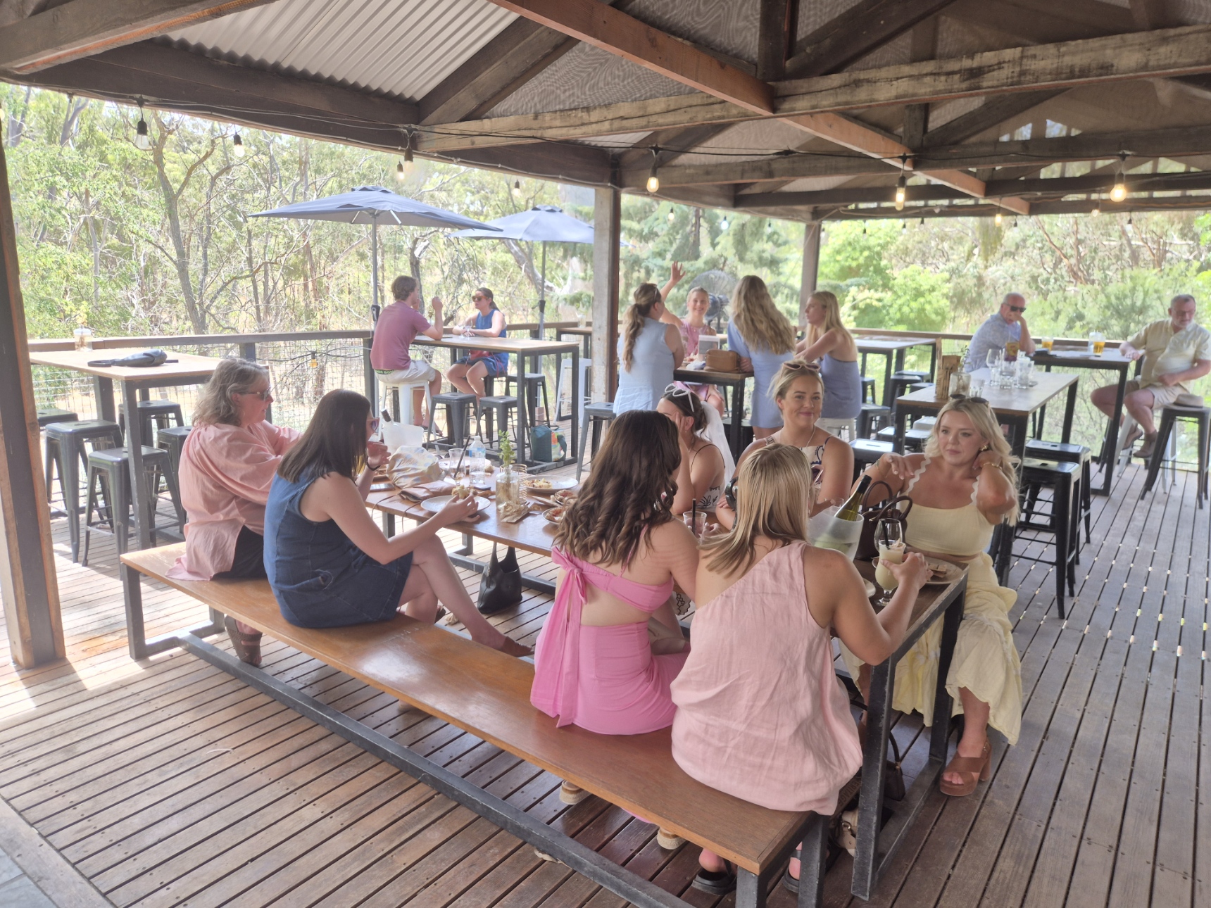 Guests enjoying wine on the Jeanneret Wines deck overlooking the Clare Valley